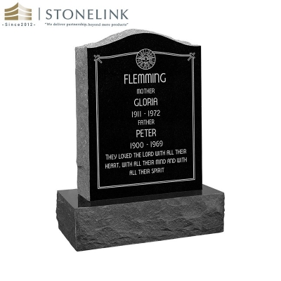 Upright multicolored granite gravestone