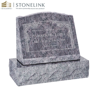 Multicolored slant granite tombstone